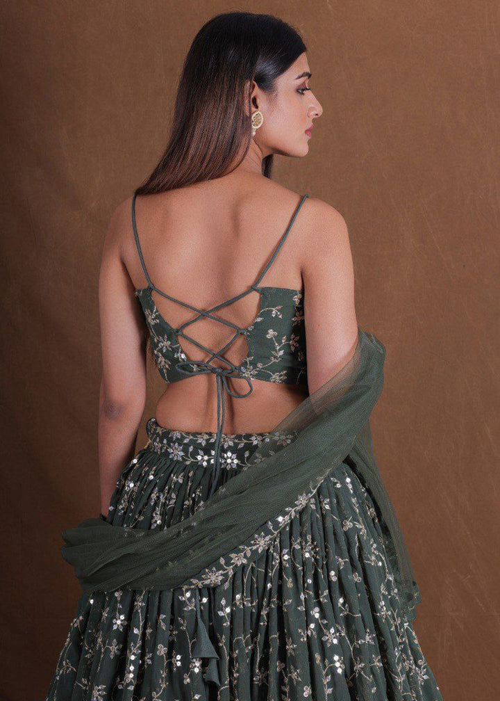 Buy Now Geogette Green Zari Sequin Mehndi Lehenga Choli Online in US, UK, Canada, France, Germany, Sweden, Greece, Denmark, Maldives, UAE & Worldwide at Empress.