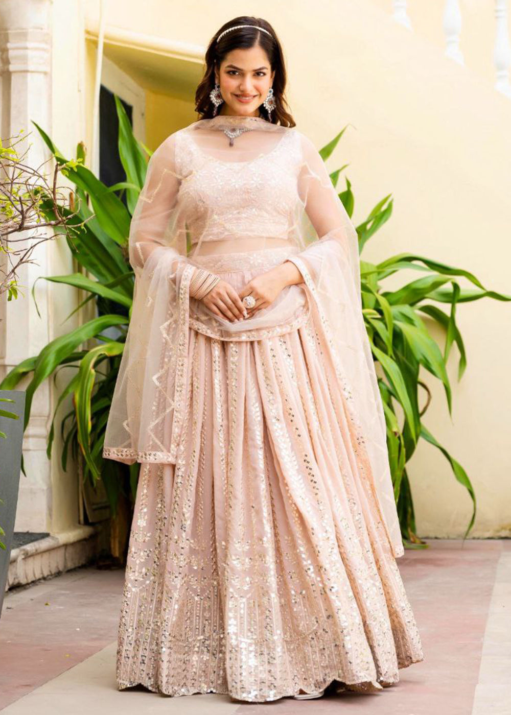 Buy Now Geogette Peach Zari Sequin Sangeet Lehenga Choli Online in US, UK, Canada, France, Germany, Sweden, Greece, Denmark, Maldives, & Worldwide at Empress.
