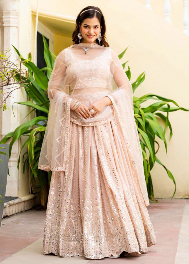 Buy Now Geogette Peach Zari Sequin Sangeet Lehenga Choli Online in US, UK, Canada, France, Germany, Sweden, Greece, Denmark, Maldives, & Worldwide at Empress.
