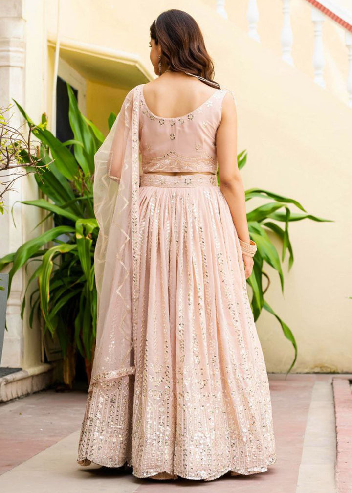 Buy Now Geogette Peach Zari Sequin Sangeet Lehenga Choli Online in US, UK, Canada, France, Germany, Sweden, Greece, Denmark, Maldives, & Worldwide at Empress.