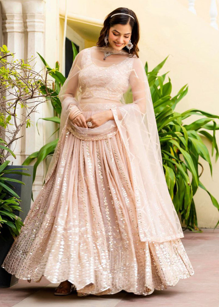 Buy Now Geogette Peach Zari Sequin Sangeet Lehenga Choli Online in US, UK, Canada, France, Germany, Sweden, Greece, Denmark, Maldives, & Worldwide at Empress.