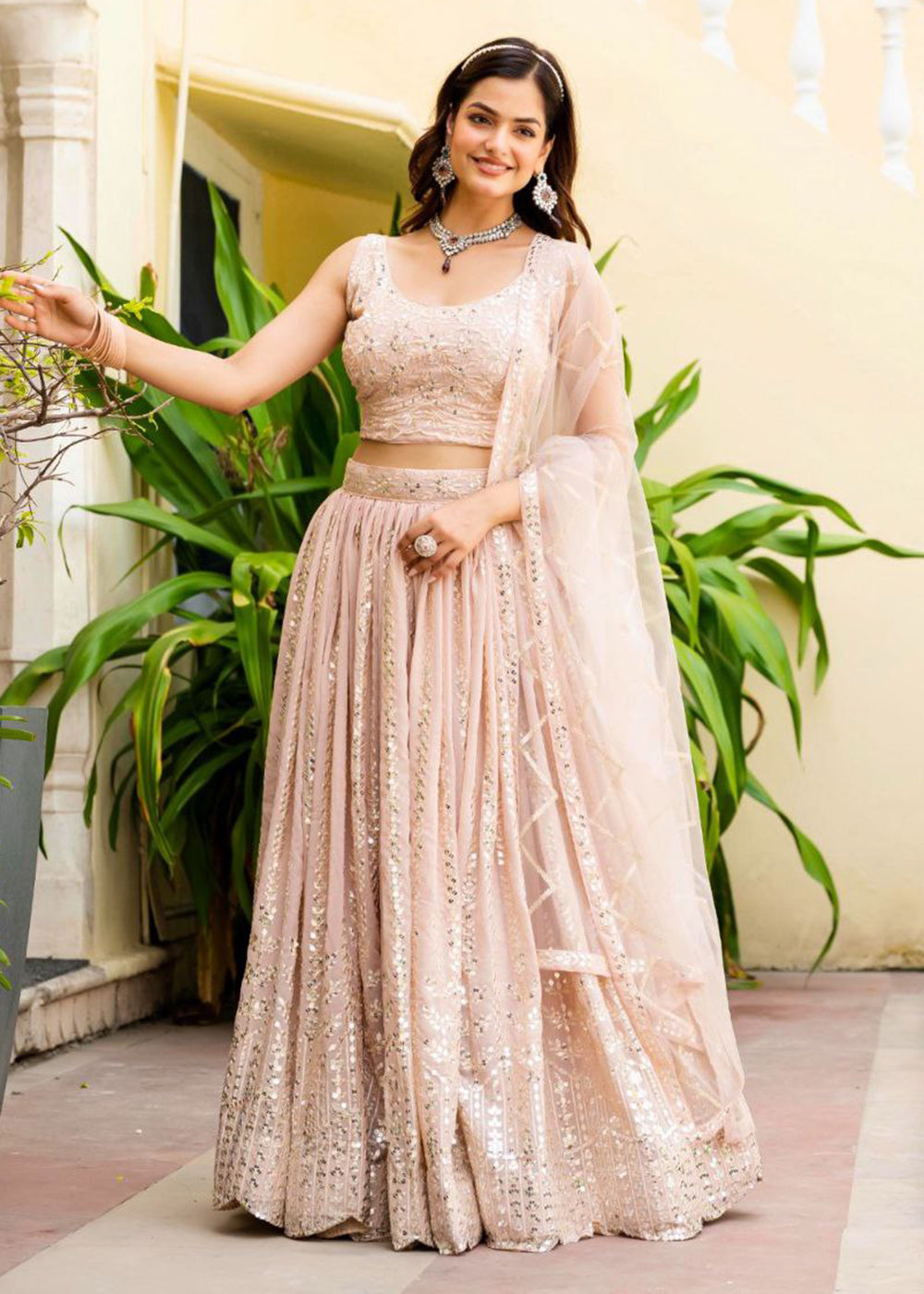 Buy Now Geogette Peach Zari Sequin Sangeet Lehenga Choli Online in US, UK, Canada, France, Germany, Sweden, Greece, Denmark, Maldives, & Worldwide at Empress.