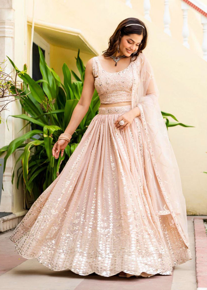 Buy Now Geogette Peach Zari Sequin Sangeet Lehenga Choli Online in US, UK, Canada, France, Germany, Sweden, Greece, Denmark, Maldives, & Worldwide at Empress.