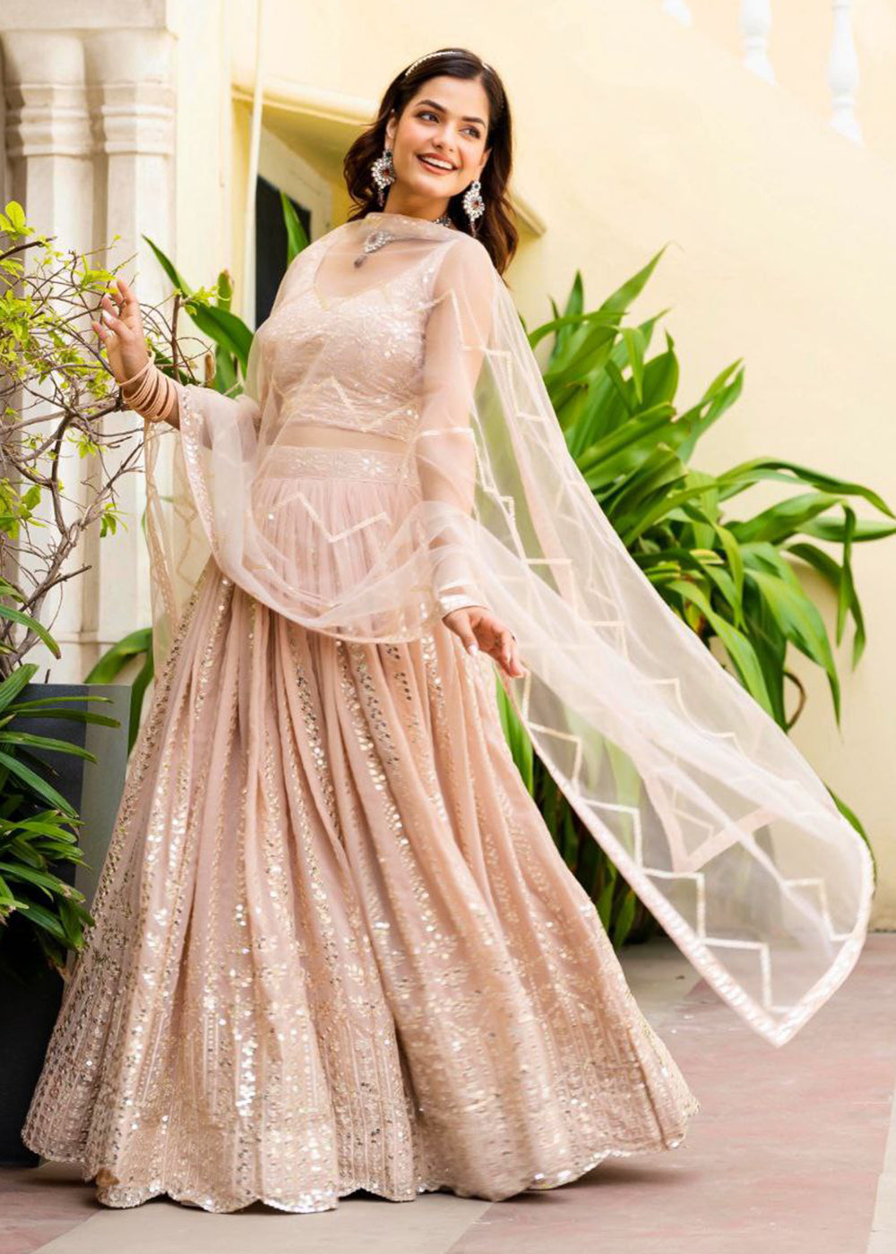Buy Now Geogette Peach Zari Sequin Sangeet Lehenga Choli Online in US, UK, Canada, France, Germany, Sweden, Greece, Denmark, Maldives, & Worldwide at Empress.