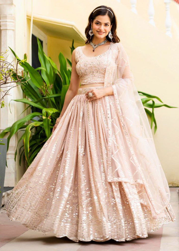 Buy Now Geogette Peach Zari Sequin Sangeet Lehenga Choli Online in US, UK, Canada, France, Germany, Sweden, Greece, Denmark, Maldives, & Worldwide at Empress.