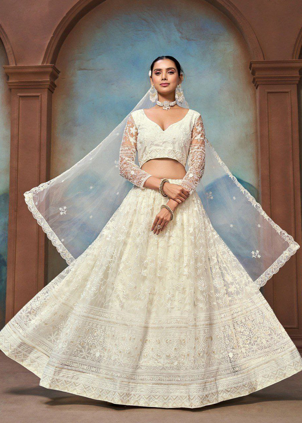 Buy Now Wedding Wear Net Off White Embroidered Lehenga Choli Online in US, UK, Canada, France, Germany, Sweden, Greece, Denmark, UAE & Worldwide at Empress.