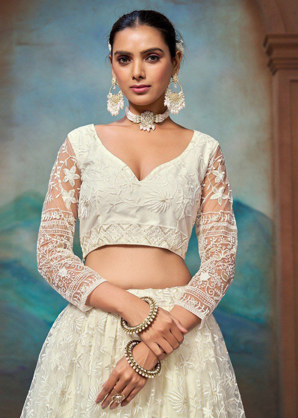 Buy Now Wedding Wear Net Off White Embroidered Lehenga Choli Online in US, UK, Canada, France, Germany, Sweden, Greece, Denmark, UAE & Worldwide at Empress.