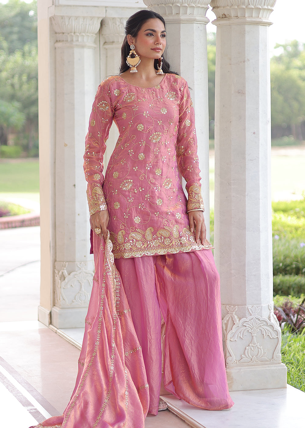 Shop Now Pink Fendy Silk Rich Sequins Sharara Suit Online at Empress in US, UK, Canada, Germany, Australia, Sweden, Denmark, UAE, Qatar, Africa & Worldwide.