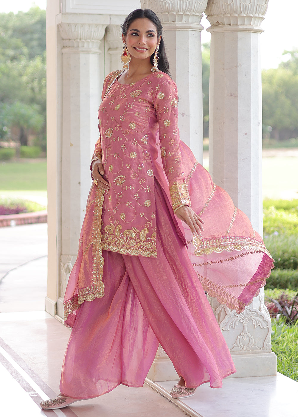 Shop Now Pink Fendy Silk Rich Sequins Sharara Suit Online at Empress in US, UK, Canada, Germany, Australia, Sweden, Denmark, UAE, Qatar, Africa & Worldwide.