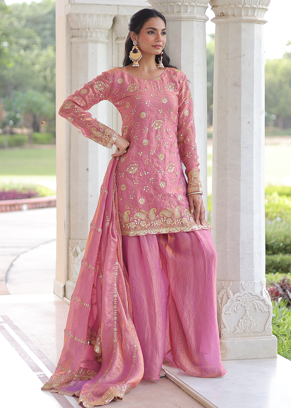 Shop Now Pink Fendy Silk Rich Sequins Sharara Suit Online at Empress in US, UK, Canada, Germany, Australia, Sweden, Denmark, UAE, Qatar, Africa & Worldwide.