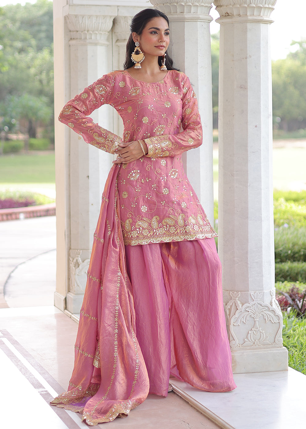 Shop Now Pink Fendy Silk Rich Sequins Sharara Suit Online at Empress in US, UK, Canada, Germany, Australia, Sweden, Denmark, UAE, Qatar, Africa & Worldwide.