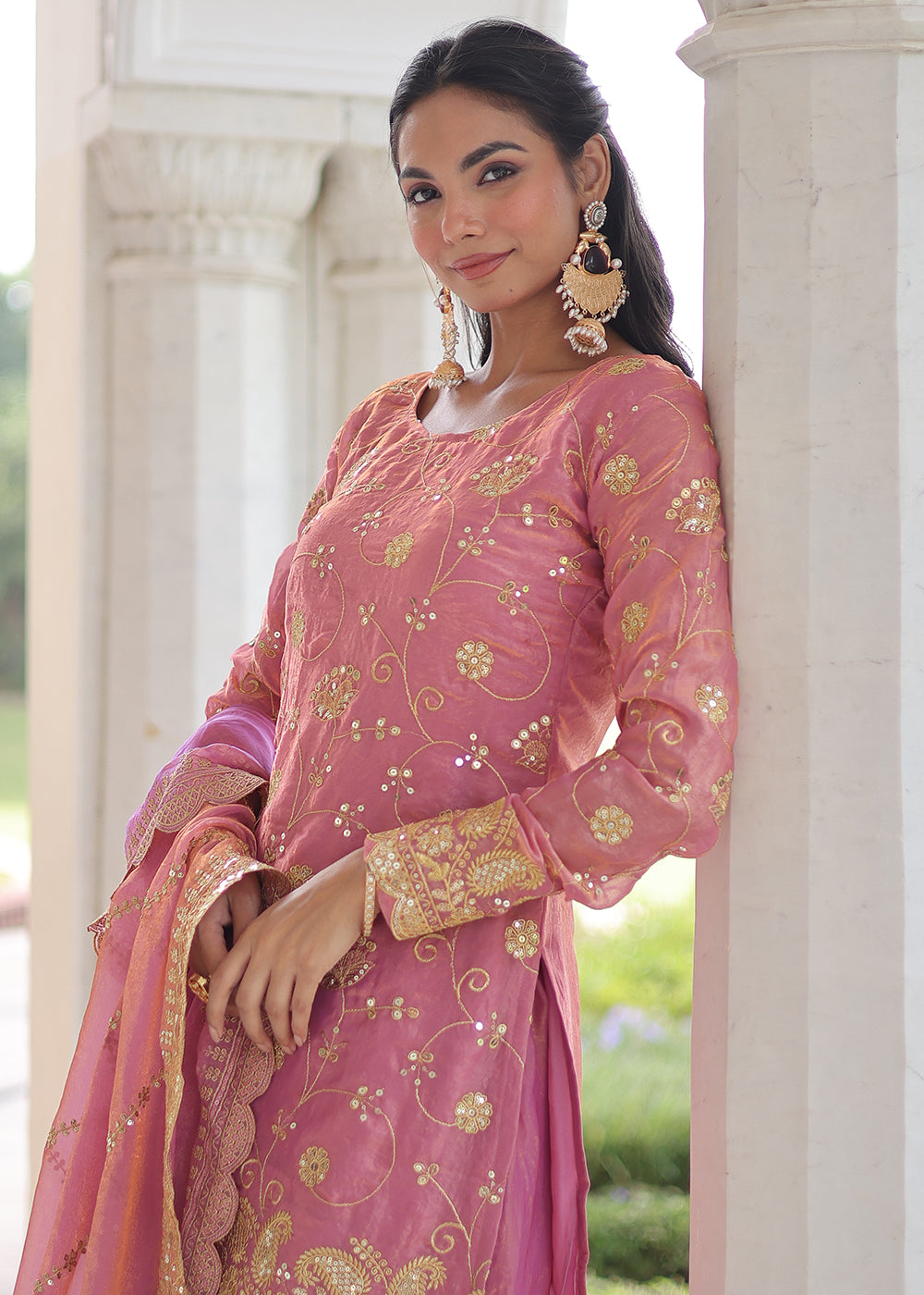 Shop Now Pink Fendy Silk Rich Sequins Sharara Suit Online at Empress in US, UK, Canada, Germany, Australia, Sweden, Denmark, UAE, Qatar, Africa & Worldwide.