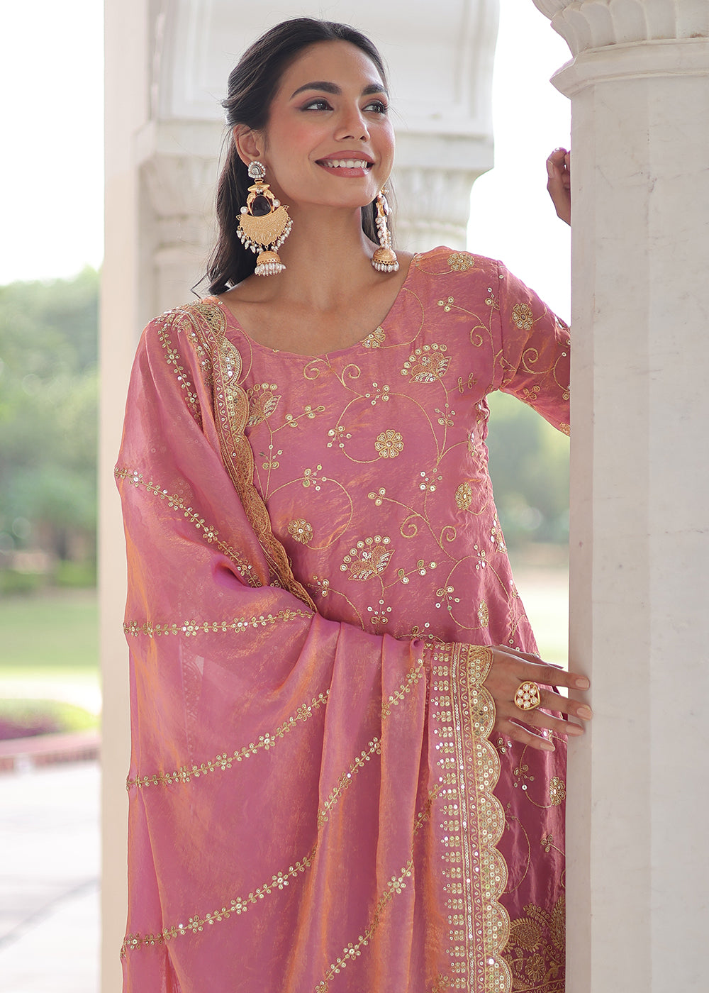 Shop Now Pink Fendy Silk Rich Sequins Sharara Suit Online at Empress in US, UK, Canada, Germany, Australia, Sweden, Denmark, UAE, Qatar, Africa & Worldwide.