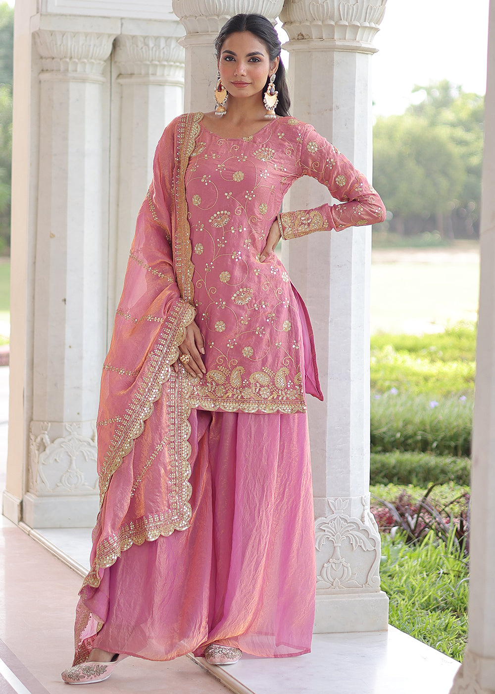 Shop Now Pink Fendy Silk Rich Sequins Sharara Suit Online at Empress in US, UK, Canada, Germany, Australia, Sweden, Denmark, UAE, Qatar, Africa & Worldwide.