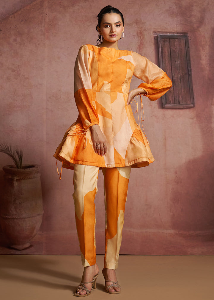 Buy Now Orange Abstract Printed Peplum Tunic &amp; Trouser Co-Ord Set Online in US, UK, Canada, Netherlands, Germany, Italy, France, Greece &amp; Worldwide at Empress.