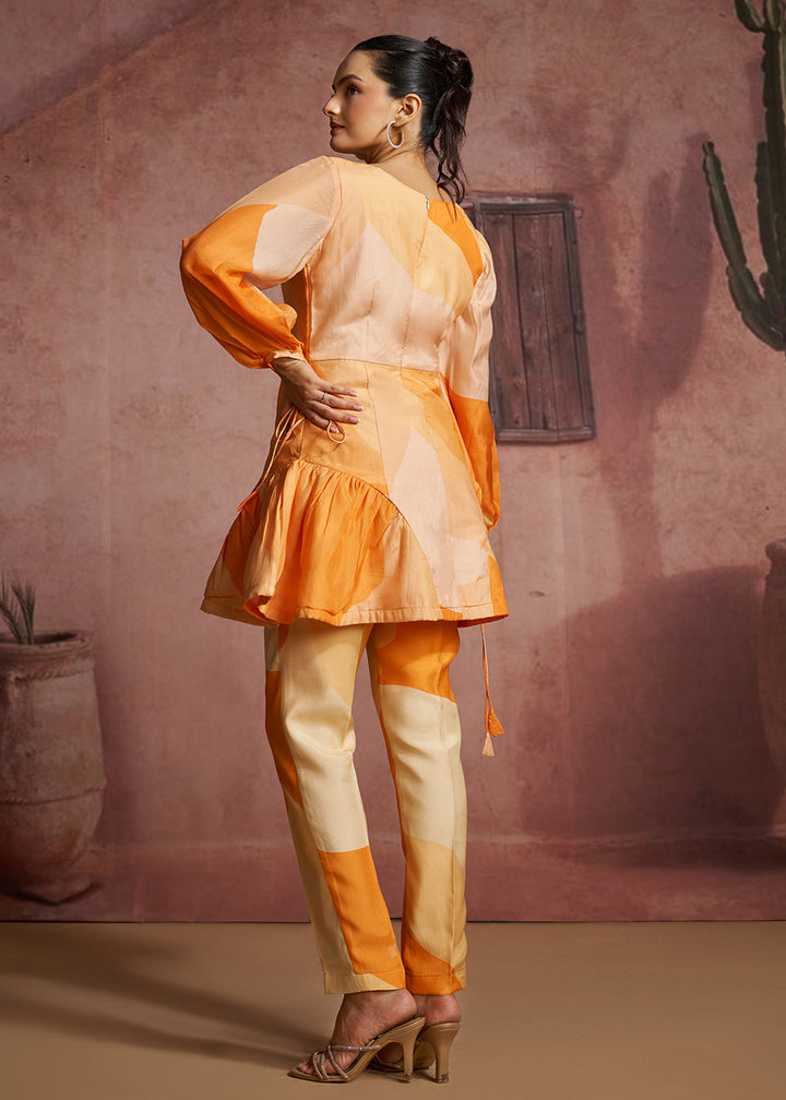 Buy Now Orange Abstract Printed Peplum Tunic &amp; Trouser Co-Ord Set Online in US, UK, Canada, Netherlands, Germany, Italy, France, Greece &amp; Worldwide at Empress.