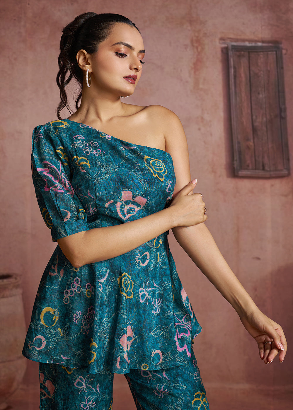 Buy Now Blue Floral Printed One-Shoulder Peplum Top & Trouser Co-Ord Set Online in US, UK, Canada, Netherlands, Germany, Italy, France & Worldwide at Empress.