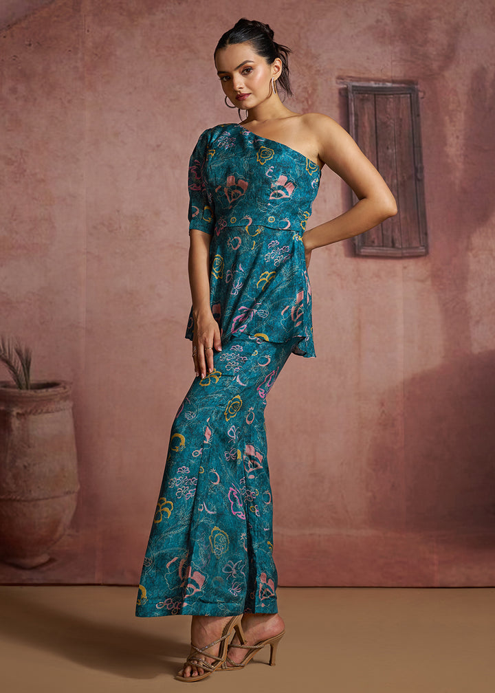 Buy Now Blue Floral Printed One-Shoulder Peplum Top &amp; Trouser Co-Ord Set Online in US, UK, Canada, Netherlands, Germany, Italy, France &amp; Worldwide at Empress.