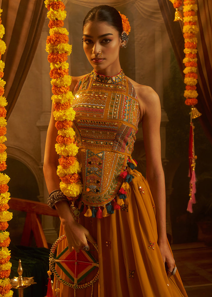 Buy Now Mustard Mirror with Shells Navratri Style Palazzo Suit Online in US, UK, Canada, Germany, Italy, France, Greece, UAE, Australia &amp; Worldwide at Empress.