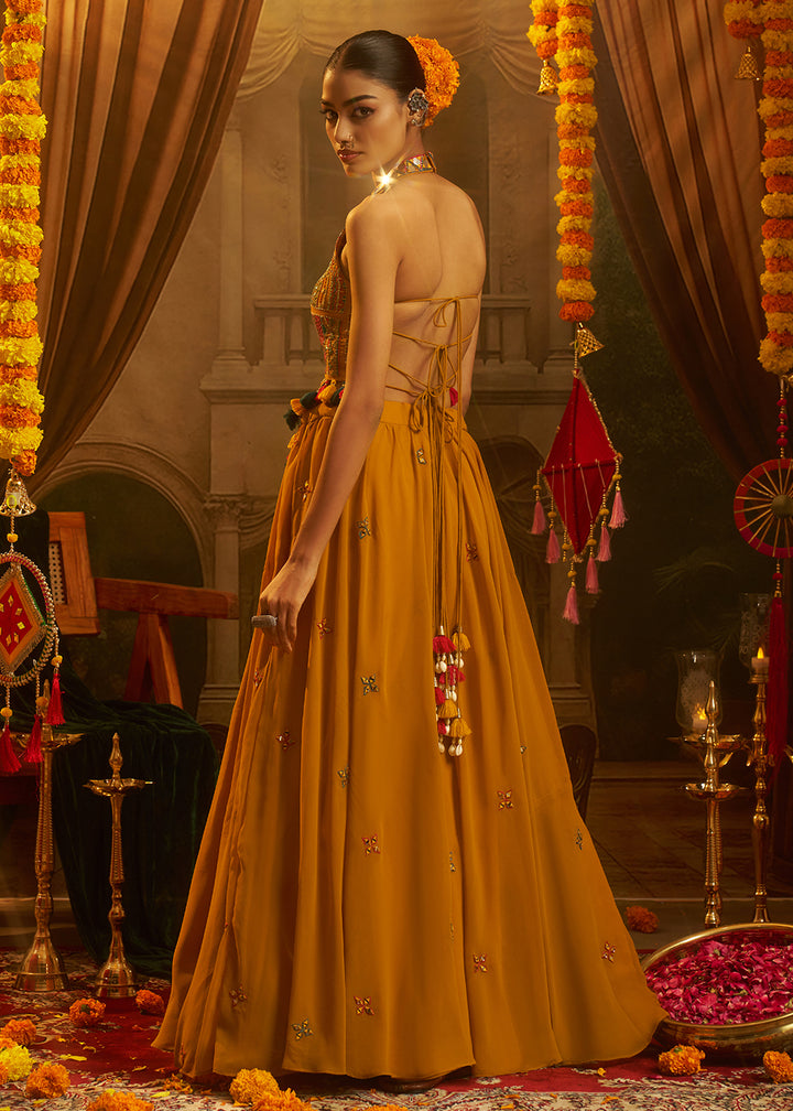 Buy Now Mustard Mirror with Shells Navratri Style Palazzo Suit Online in US, UK, Canada, Germany, Italy, France, Greece, UAE, Australia &amp; Worldwide at Empress.