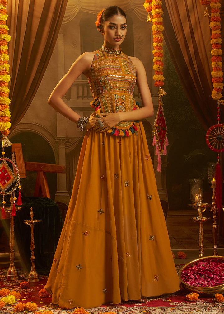 Buy Now Mustard Mirror with Shells Navratri Style Palazzo Suit Online in US, UK, Canada, Germany, Italy, France, Greece, UAE, Australia &amp; Worldwide at Empress.