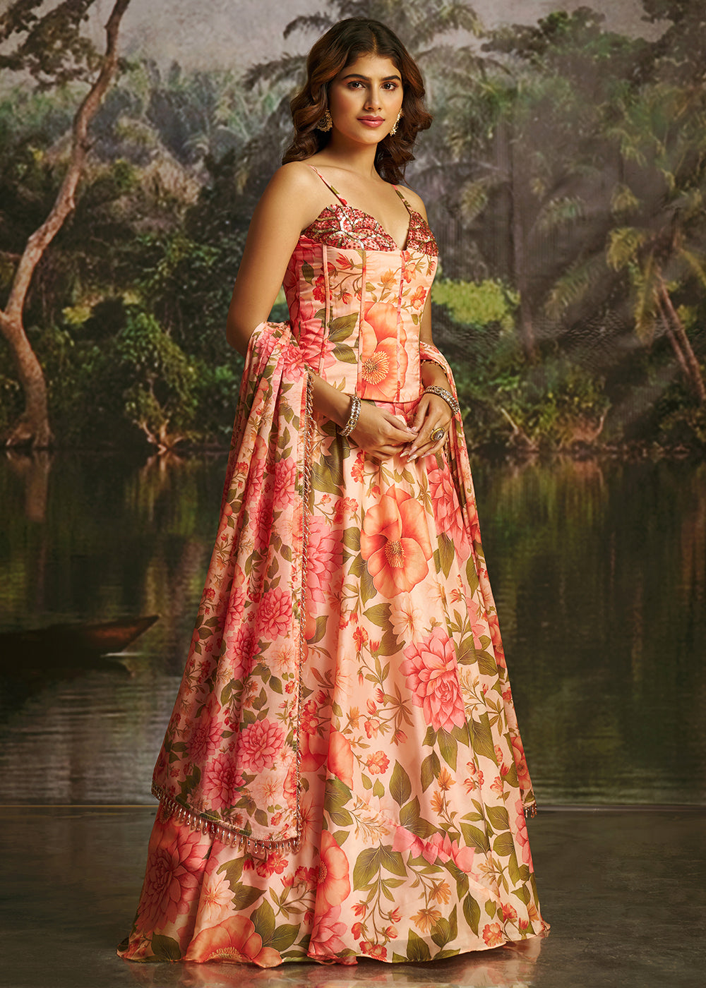 Buy Now Peach Floral Print Corset Style Party Wear Lehenga Choli Online in US, UK, Canada, France, Italy, Germany, UAE, Switzerland, UAE &amp; Worldwide at Empress.