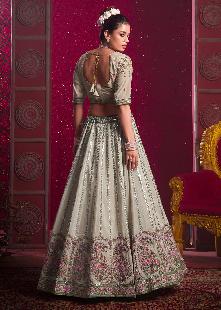 Buy Now Cream Premium Silk Embroidered Bridesmaids Lehenga Choli Online in USA, UK, Canada & Worldwide at Empress Clothing.