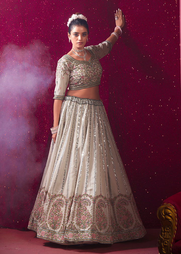 Buy Now Cream Premium Silk Embroidered Bridesmaids Lehenga Choli Online in USA, UK, Canada & Worldwide at Empress Clothing.