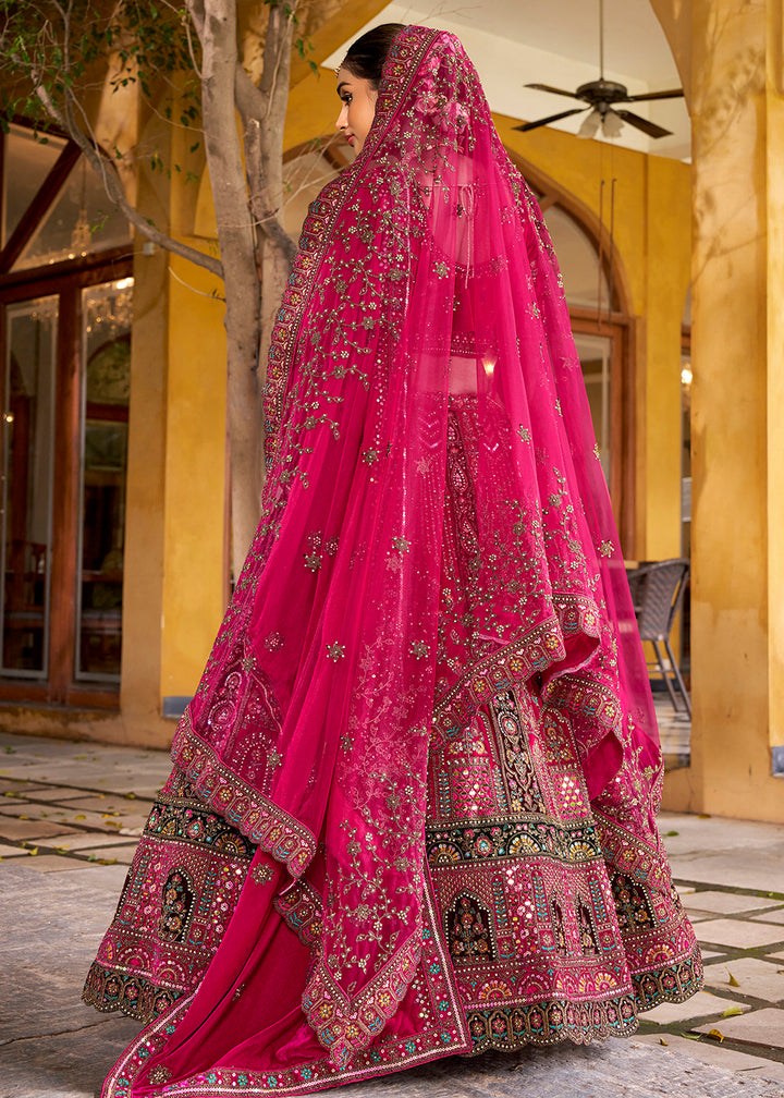 Buy Now Rani Pink Traditional Bridal Style Embroidered Lehenga Choli Online in US, UK, Canada, France, Italy, Germany, Greece, Malta & Worldwide at Empress.