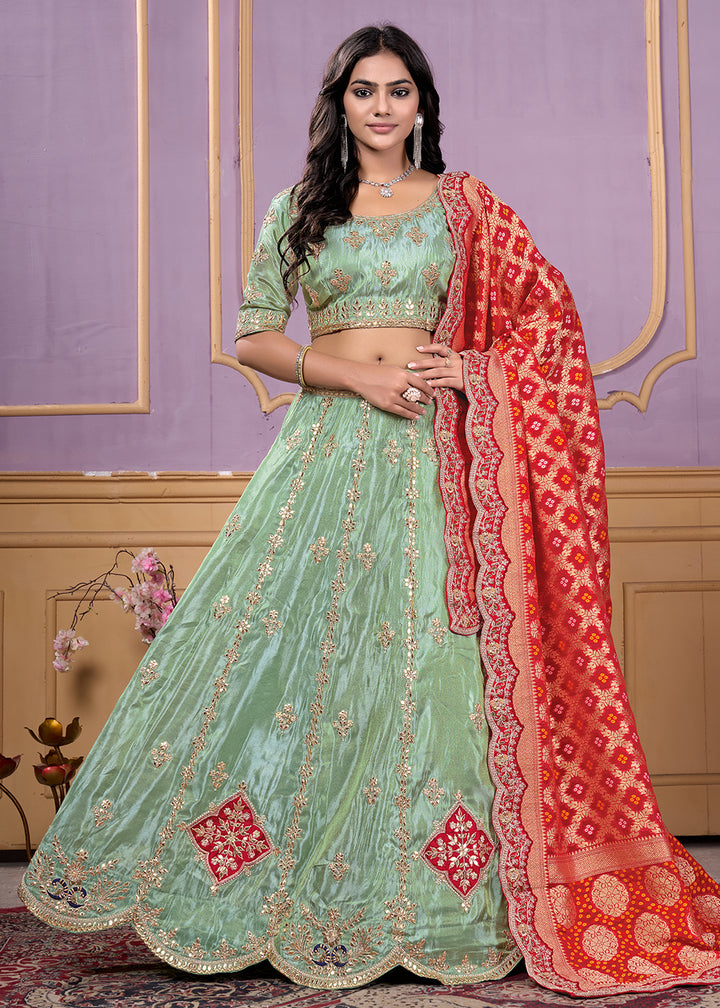 Buy Now Green Heavy Embroidered Wedding Bridal Lehenga Choli Online in USA, UK, Canada, France, Italy, Germany, Australia, UAE & Worldwide at Empress Clothing.