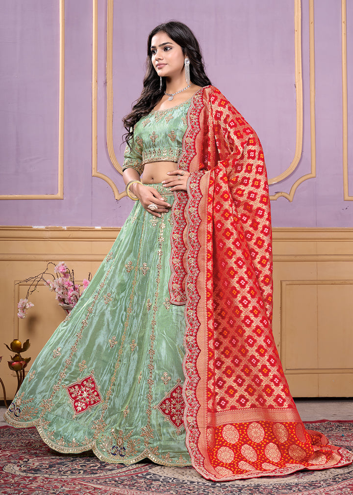 Buy Now Green Heavy Embroidered Wedding Bridal Lehenga Choli Online in USA, UK, Canada, France, Italy, Germany, Australia, UAE & Worldwide at Empress Clothing.