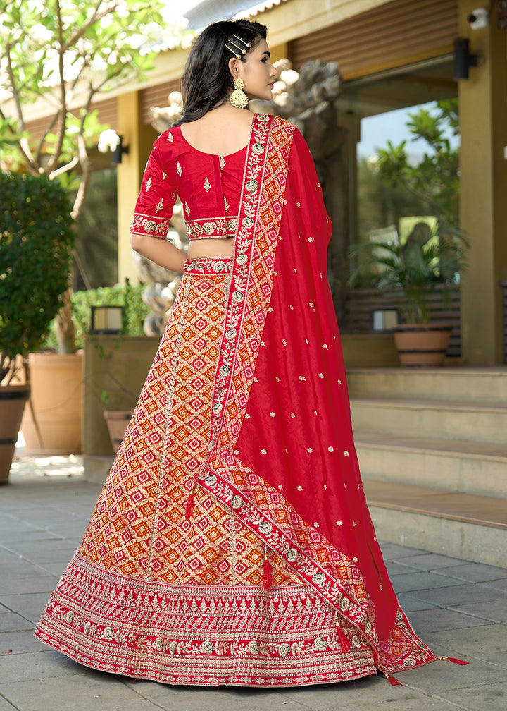 Buy Now Red Heavy Embroidered Wedding Designer Lehenga Choli Online in USA, UK, Canada, France, Italy, Germany, Australia, UAE & Worldwide at Empress Clothing.