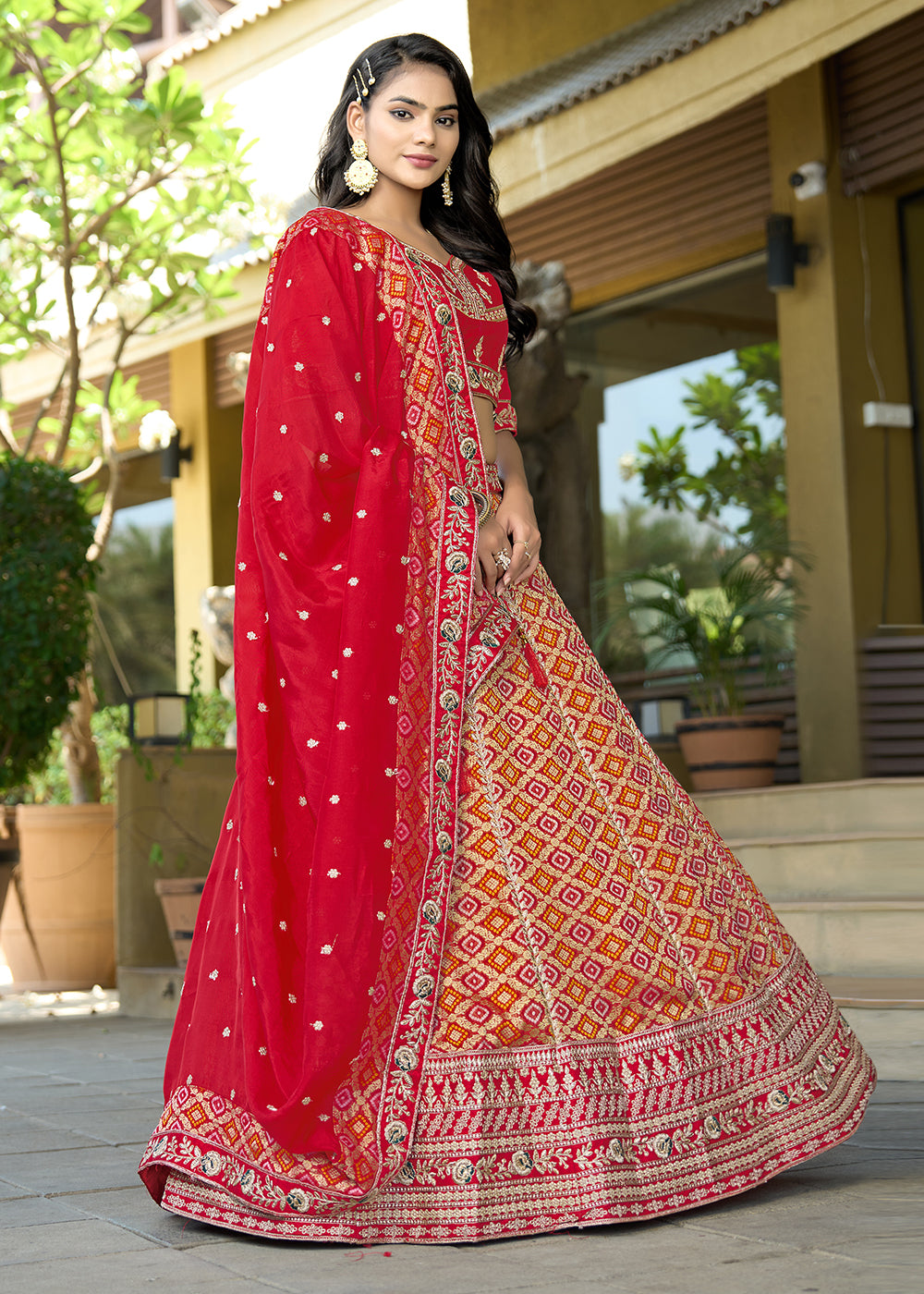 Buy Now Red Heavy Embroidered Wedding Designer Lehenga Choli Online in USA, UK, Canada, France, Italy, Germany, Australia, UAE & Worldwide at Empress Clothing.