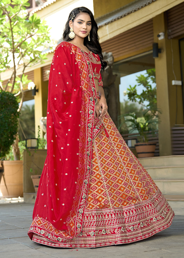 Buy Now Red Heavy Embroidered Wedding Designer Lehenga Choli Online in USA, UK, Canada, France, Italy, Germany, Australia, UAE & Worldwide at Empress Clothing.