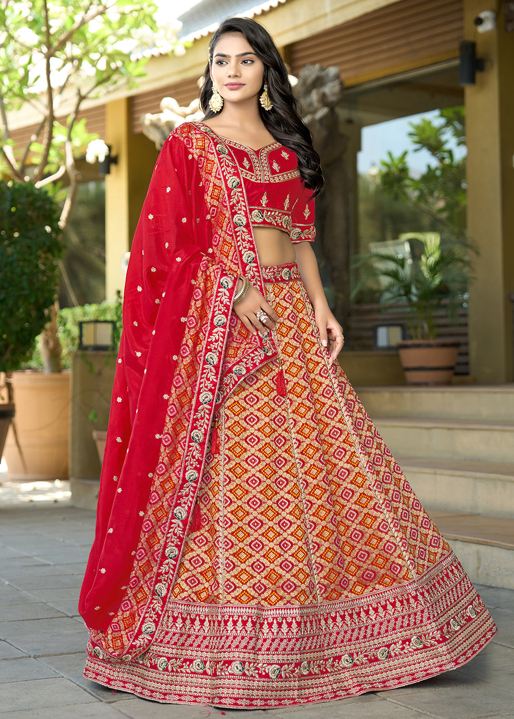 Buy Now Red Heavy Embroidered Wedding Designer Lehenga Choli Online in USA, UK, Canada, France, Italy, Germany, Australia, UAE & Worldwide at Empress Clothing.
