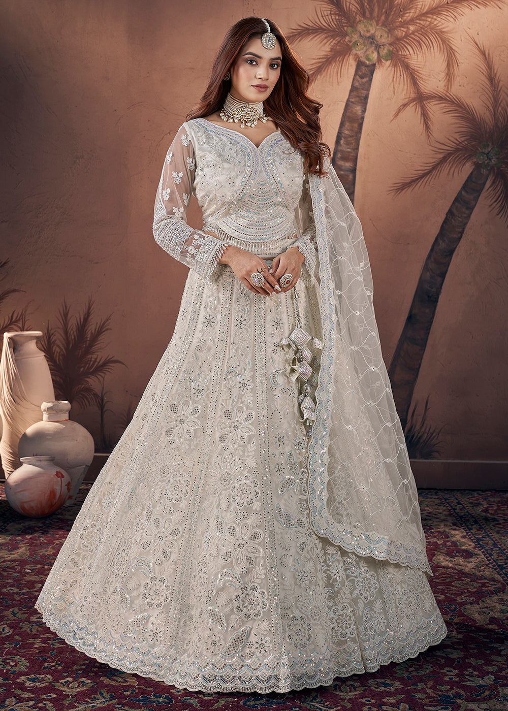 Buy Now Premium Net Off White Heavy Handwork Bridal Lehenga Choli Online in USA, UK, Canada & Worldwide at Empress Clothing.