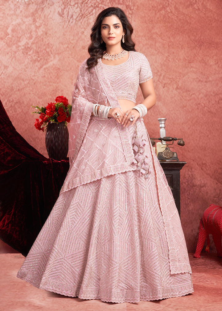 Buy Now Zarkan Heavy Embroidered Baby Pink Bridal Lehenga Choli Online in USA, UK, Canada & Worldwide at Empress Clothing. 