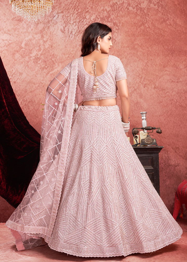 Buy Now Zarkan Heavy Embroidered Baby Pink Bridal Lehenga Choli Online in USA, UK, Canada & Worldwide at Empress Clothing. 