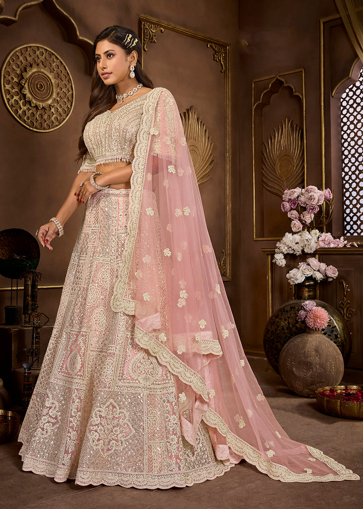 Buy Now Peach Heavy Embroidered Designer Bridal Lehenga Choli Online in USA, UK, Canada, UAE & Worldwide at Empress Clothing.