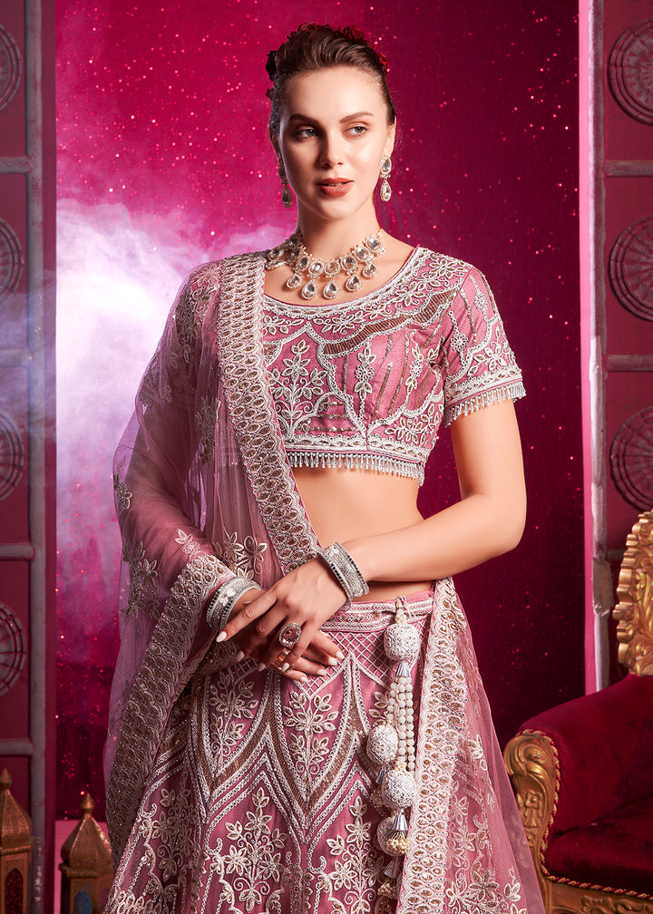 Buy Now Premium Net Pink Embroidered Designer Lehenga Choli Online in USA, UK, France & Worldwide at Empress Clothing.