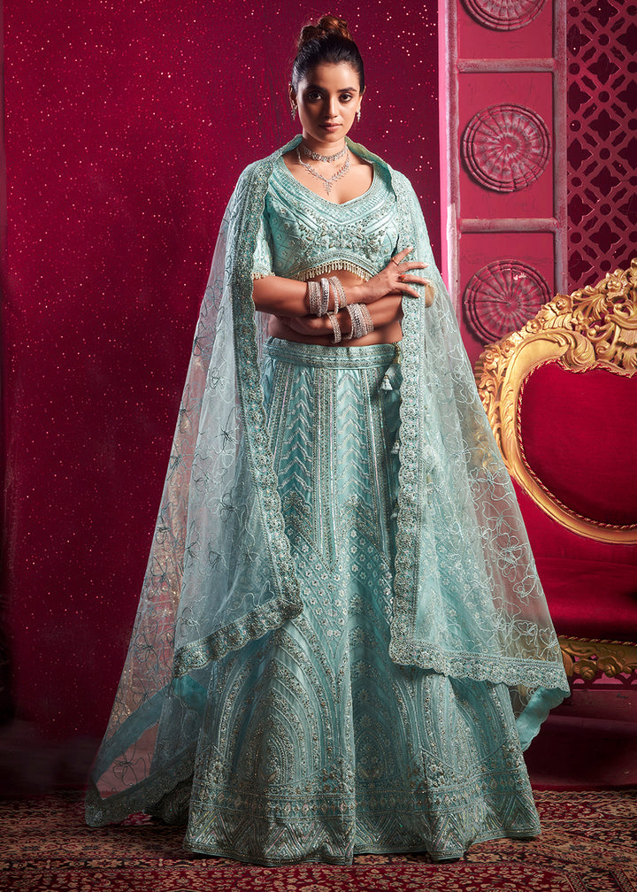 Buy Now Premium Net Sky Blue Embroidered Designer Lehenga Choli Online in USA, UK, Canada & Worldwide at Empress Clothing.