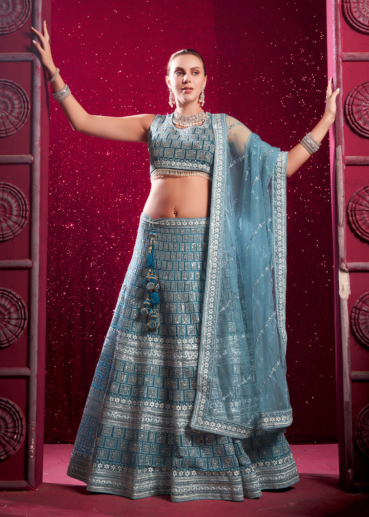 Buy Now Premium Net Pastel Blue Embroidered Designer Lehenga Choli Online in USA, UK, Canada & Worldwide at Empress Clothing.