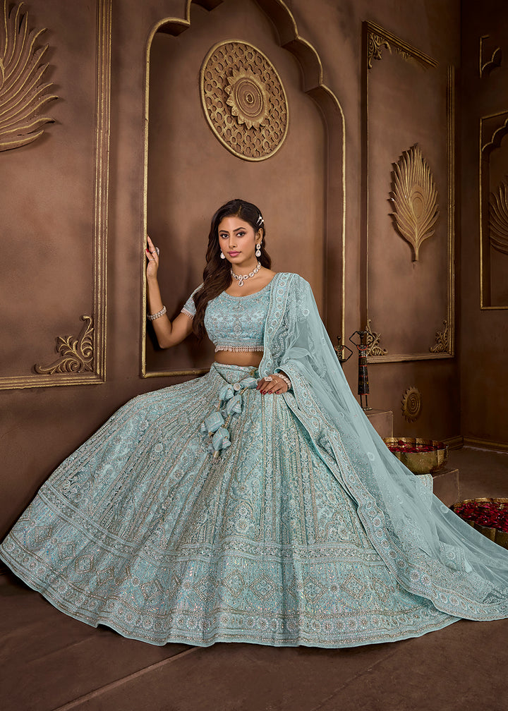 Buy Now Sky Blue Heavy Embroidered Designer Bridal Lehenga Choli Online in USA, UK, Canada, UAE & Worldwide at Empress Clothing