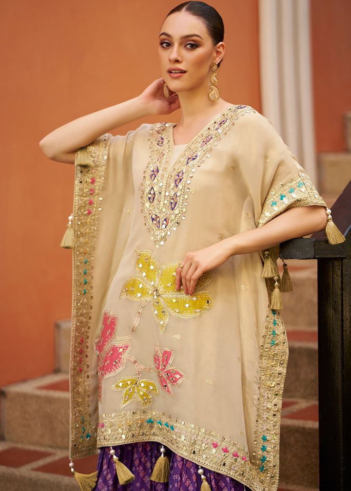 Buy Now Cream Embroidered Kaftan Style Trendy Gharara Suit Online in USA, UK, Canada, Germany, Italy, France, Austria, Denmark, UAE & Worldwide at Empress.