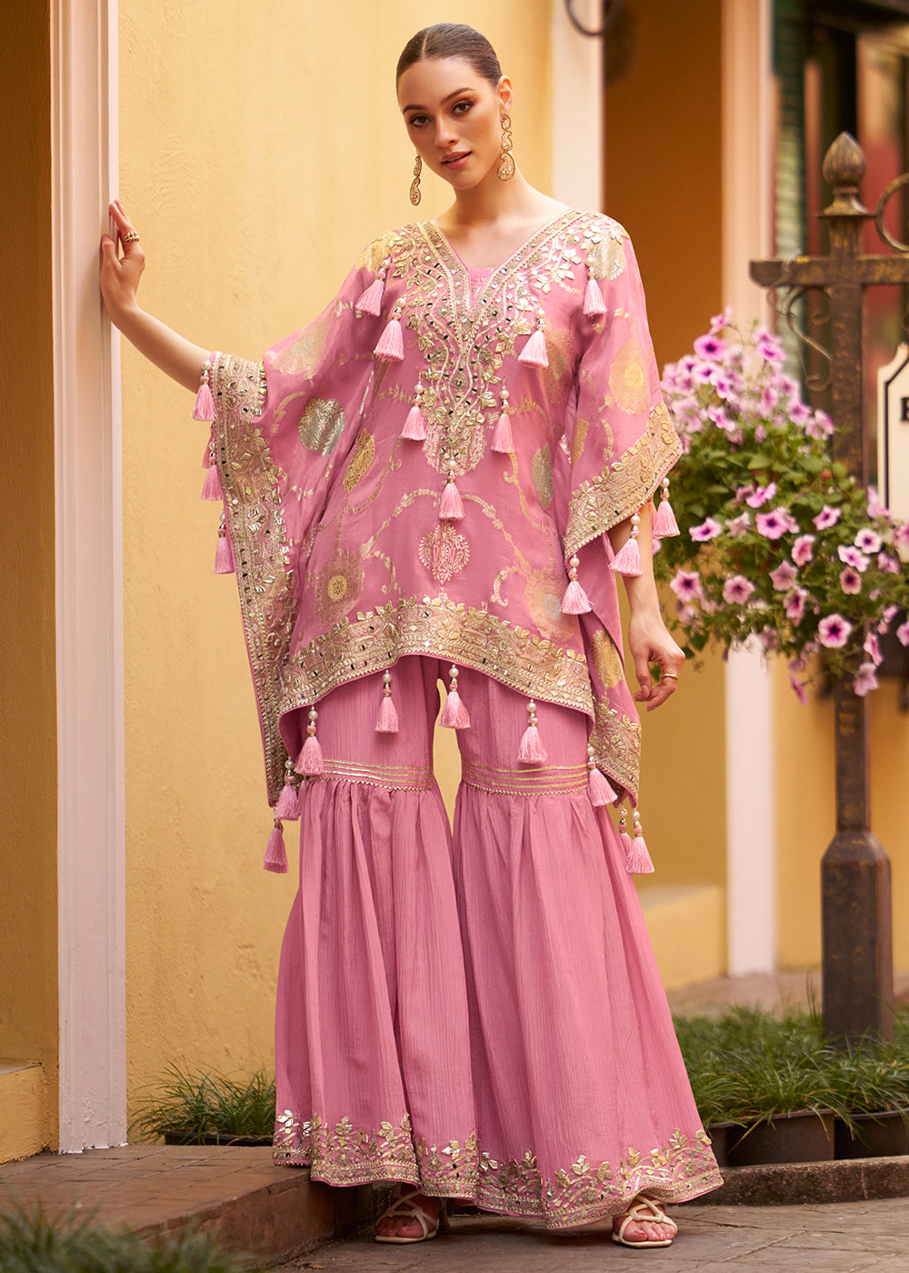 Buy Now Pink Embroidered Kaftan Style Trendy Gharara Suit Online in USA, UK, Canada, Germany, Italy, France, Austria, Denmark, UAE & Worldwide at Empress.