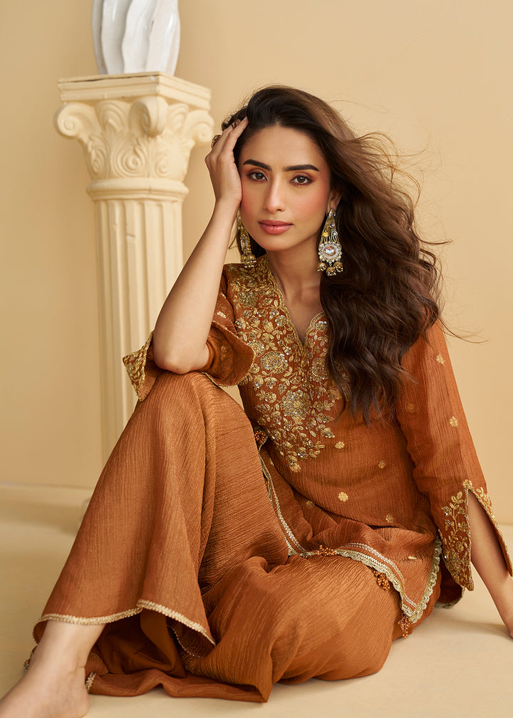 Buy Now Rusty Brown Wedding Festive Palazzo Style Suit Online in US, UK, Canada, Germany, Italy, France, Austria, Australia, Denmark & Worldwide at Empress.