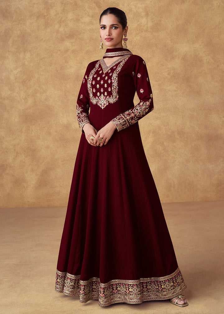 Buy Now Embroidered Maroon Chinnon Silk Festive Anarkali Suit Online in USA, UK, Australia, Italy, Germany, Canada, UAE & Worldwide at Empress Clothing.