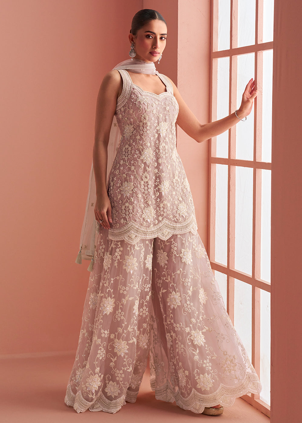 Buy Now Net Blush Pink Embroidered Party Wear Palazzo Suit Online in New York, Los Angeles, San Jose, Chicago, Houston, Fremont, Dubai & Worldwide at Empress.