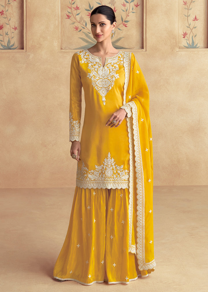 Shop Now Yellow Silk Embroidered Festive Gharara Suit Online at Empress Clothing in USA, UK, Canada, Germany, UAE & Worldwide. 