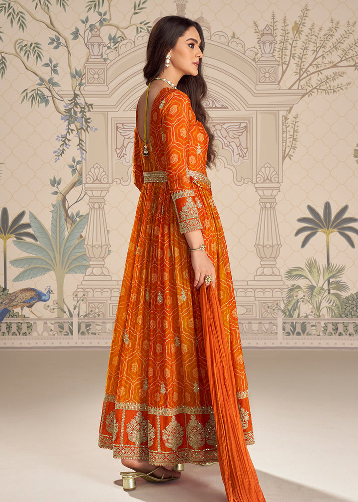 Buy Now Orange Chinnon Silk Slit Frock Style Anarkali Dress Online in USA, UK, Sweden, Denmark, Greece, Germany, Canada, Austria, UAE & Worldwide at Empress.